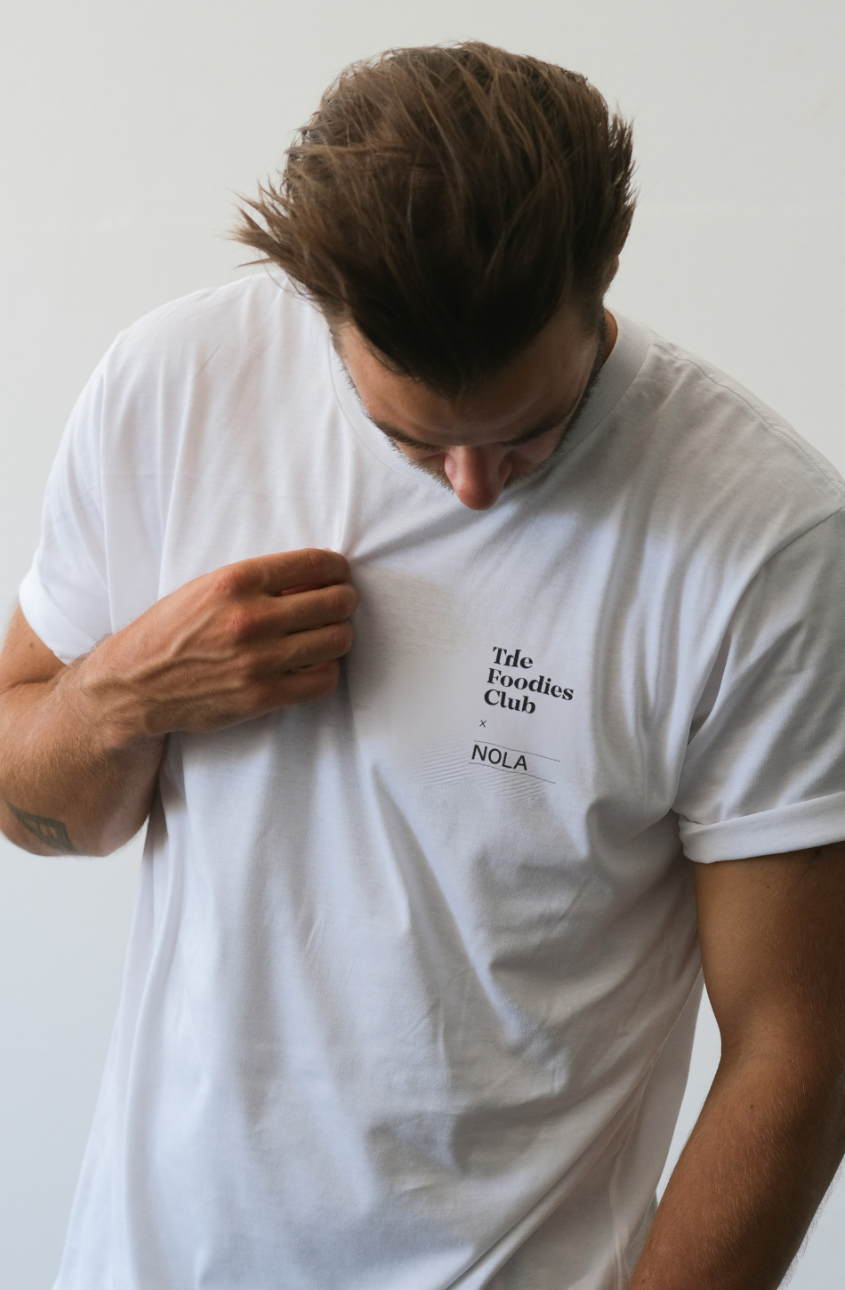 Foodies Gifts T-shirt featuring The Foodies Club x NOLA design with humorous "Life is a Dick" graphic on a casual tee.