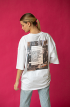 Foodies Gifts x NOLA T-shirt featuring the bold "Life is a Dick" graphic, casual cotton tee with vibrant print.